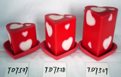 Scented pillar candle in heart shape