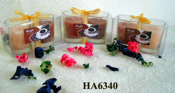 Scented candles filled in glass holder