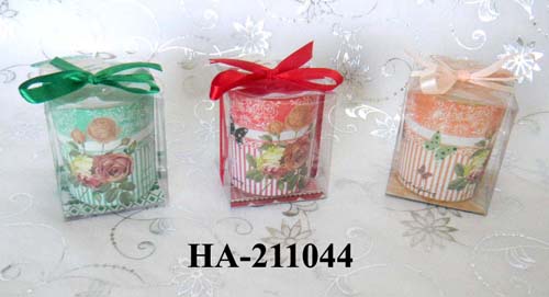 scented candles in printed glass holder