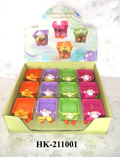 garden candle in ceramic holder by display box