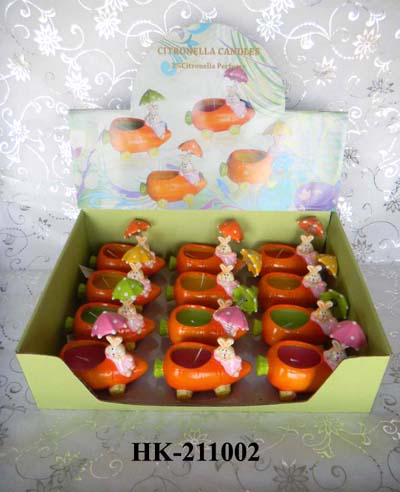 garden candle in ceramic holder by display box