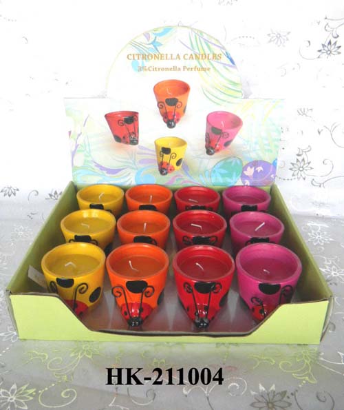 garden candle in ceramic holder by display box