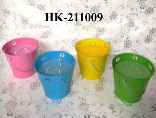 garden candle in iron holder by display box